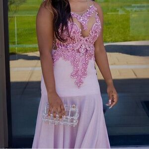 Beautiful beaded and mesh top formal dress ready for the right occasion.